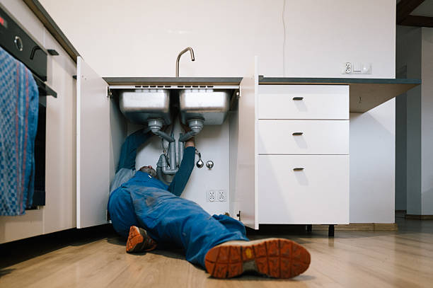 Professional Drain Cleaning technician working in Springfield, FL